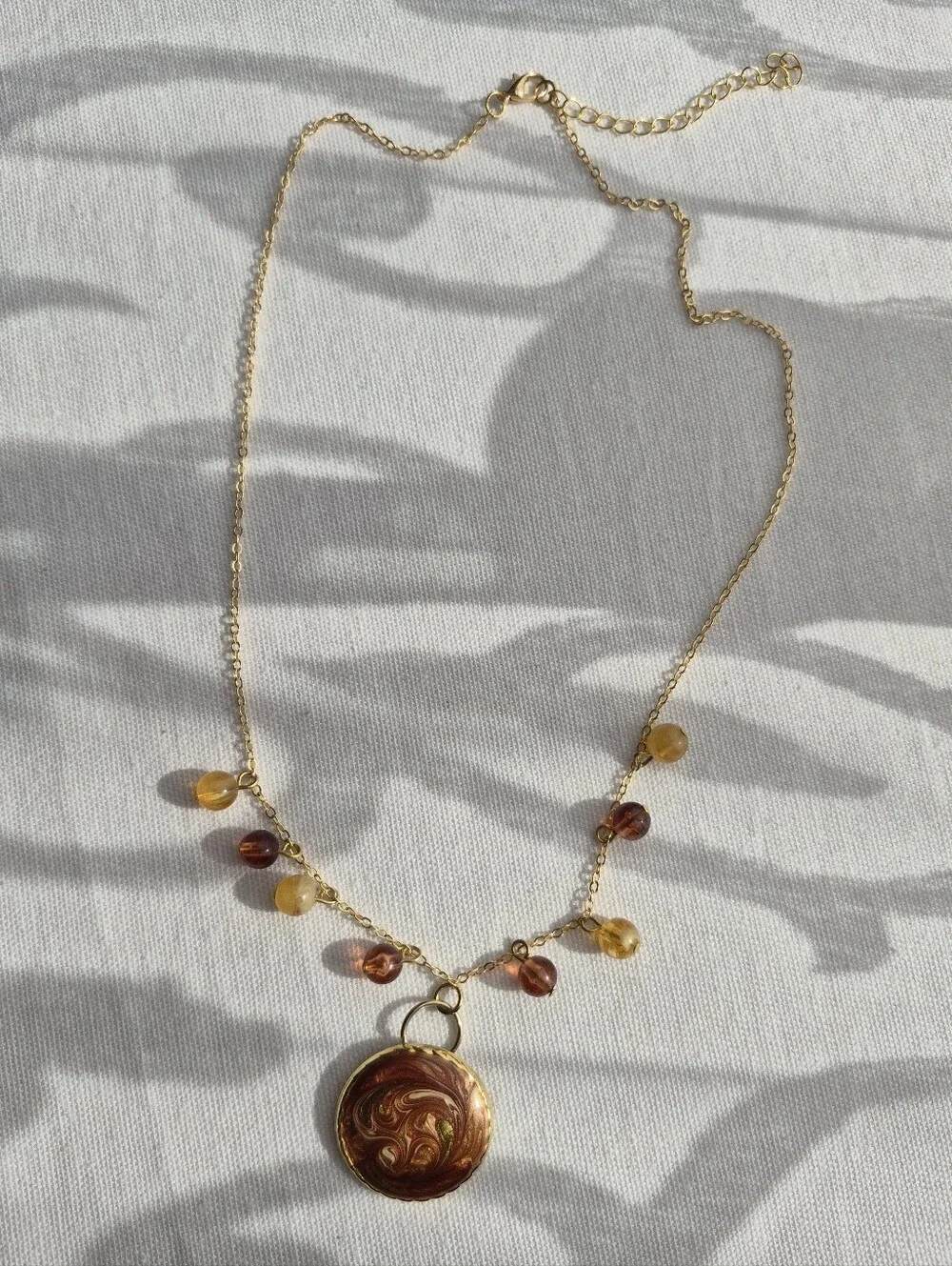 Reimagined Goldtone Swirl Pendant Necklace